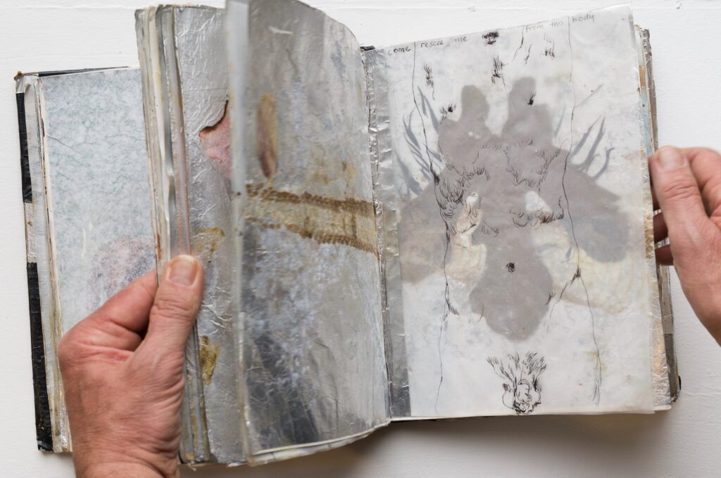 Jesse Leroy Smith - 'Greek Books' - mix media collage, tracing paper in found books